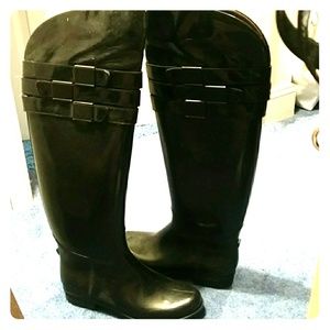 Rubber, rain over the knee boots