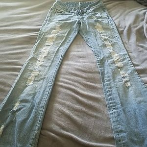 Bebe Distressed ripped jeans