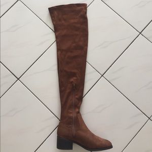 Over the knee high boots with a small heel