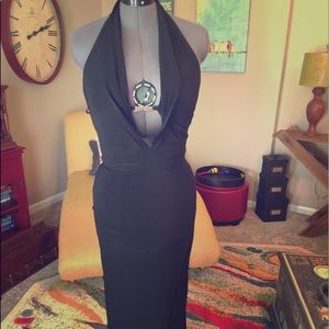 Long, black, evening gown with plunging neckline