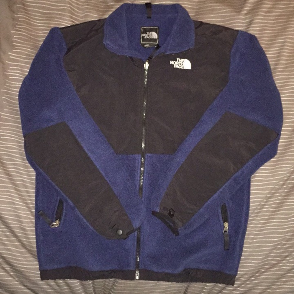 The North Face jacket in black and blue.