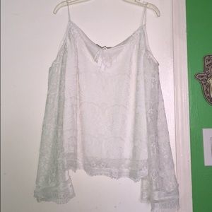 Flowy white shirt with lace-like detail