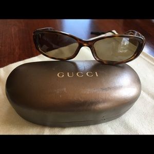 Gucci sunglasses with case.