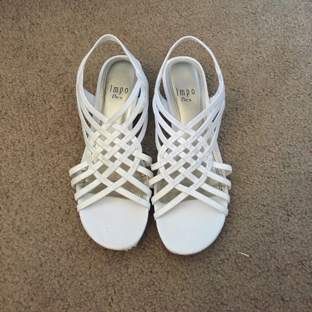 White dress shoes. Small wedge.