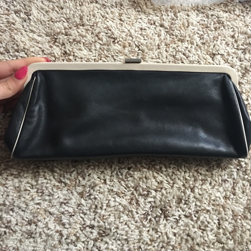 it is a ann taylor leather clutch, no damage