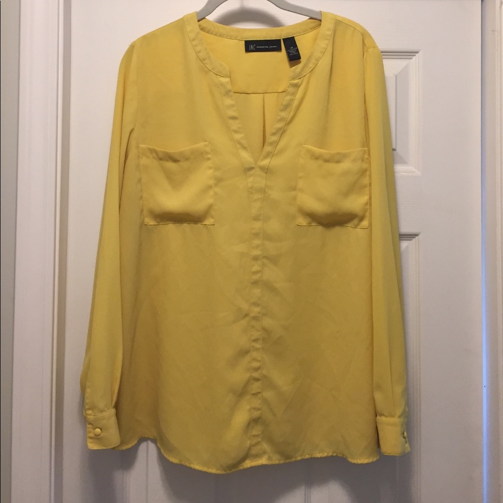 Beautiful Yellow 100% polyester blouse.