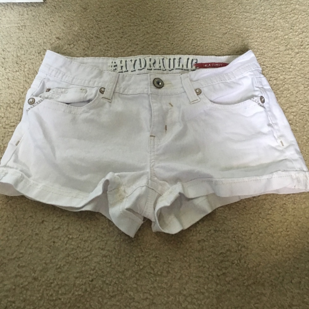 White hydraulic jean shorts.
