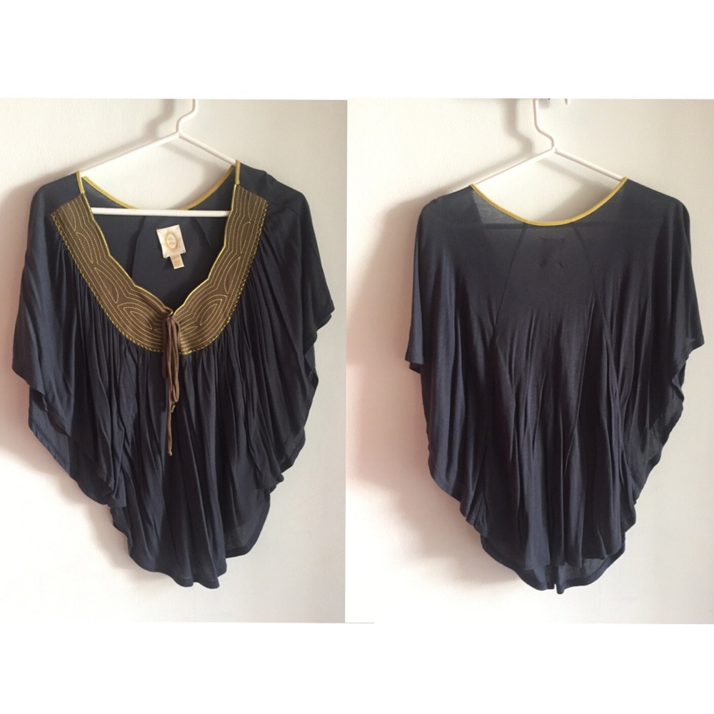 embroidered neckline with bat sleeves