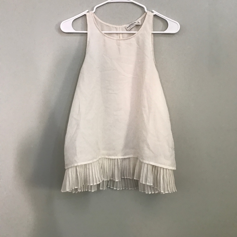 Cream tank with pleated hem