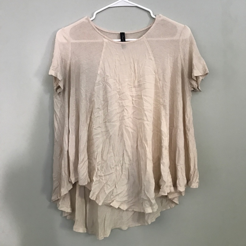 Cream swing tee