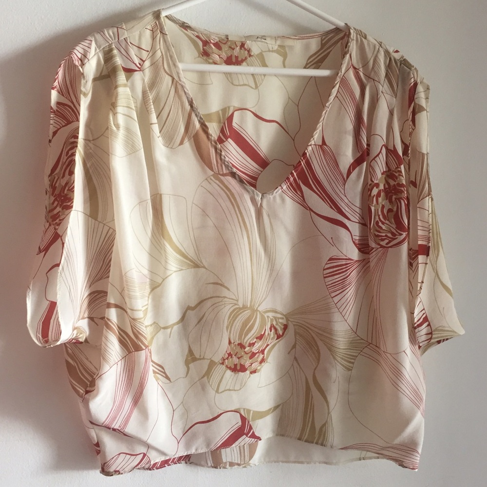 enlarged floral printed blouse