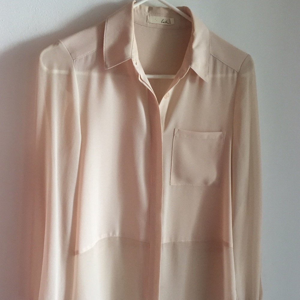 blush button down blouse with high low hemline