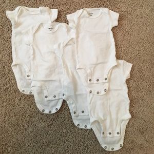 5 white newborn onesies - carters