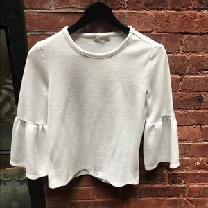 White bell-sleeve top