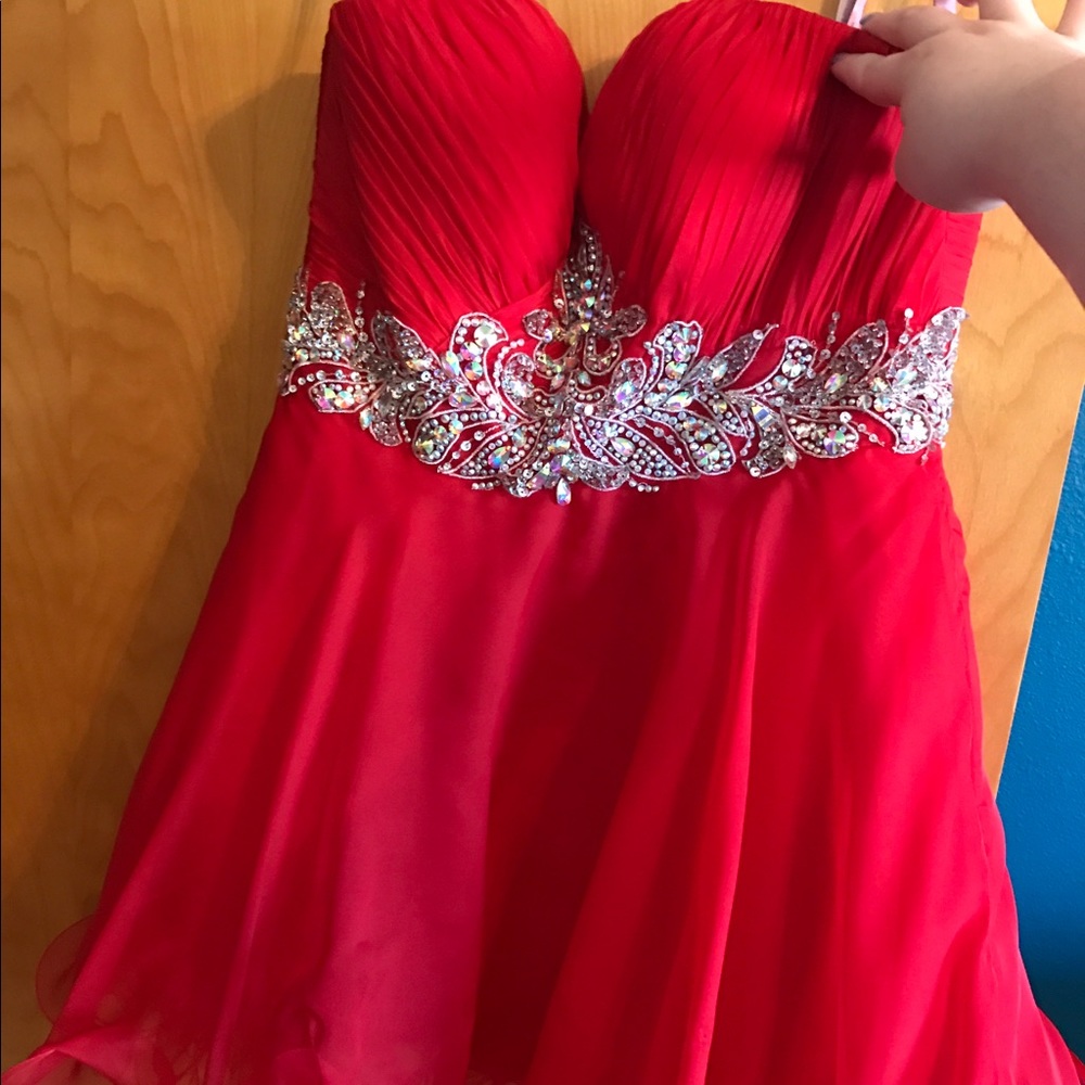 Beautiful red Blush homecoming dress.