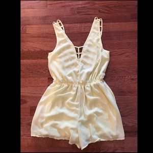 Blush Boutique yellow cage romper size medium