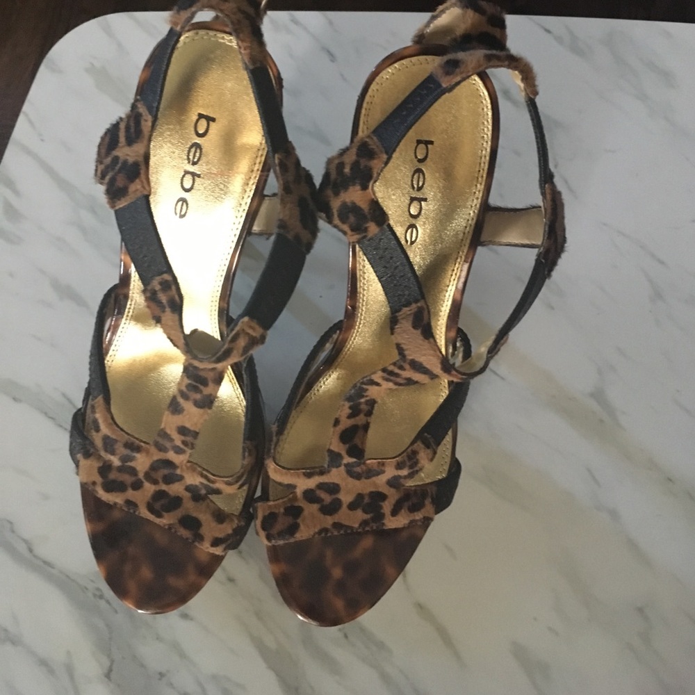 Size 8 leopard Bebe heels