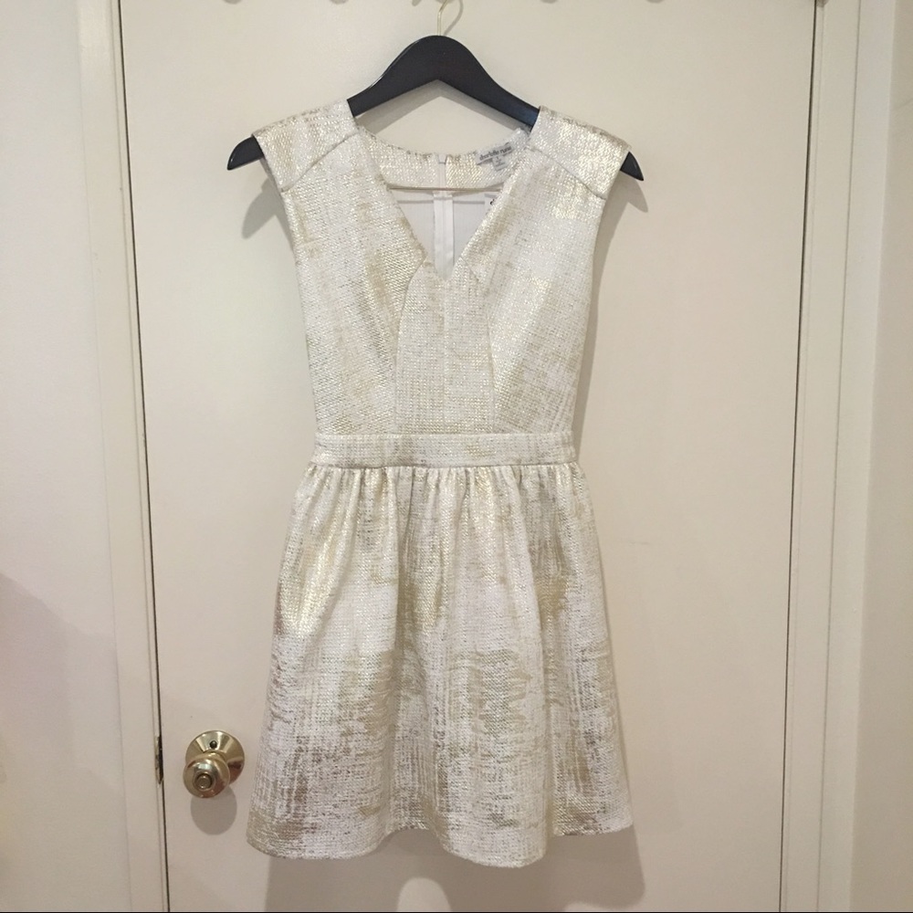 Gold padded shoulder dress