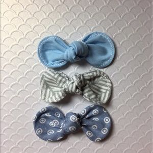 Set of 3 knotted bows w/ light tan nylon band