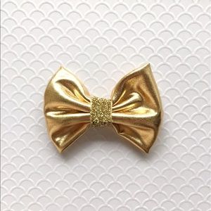 Gold bow w/ light tan nylon band