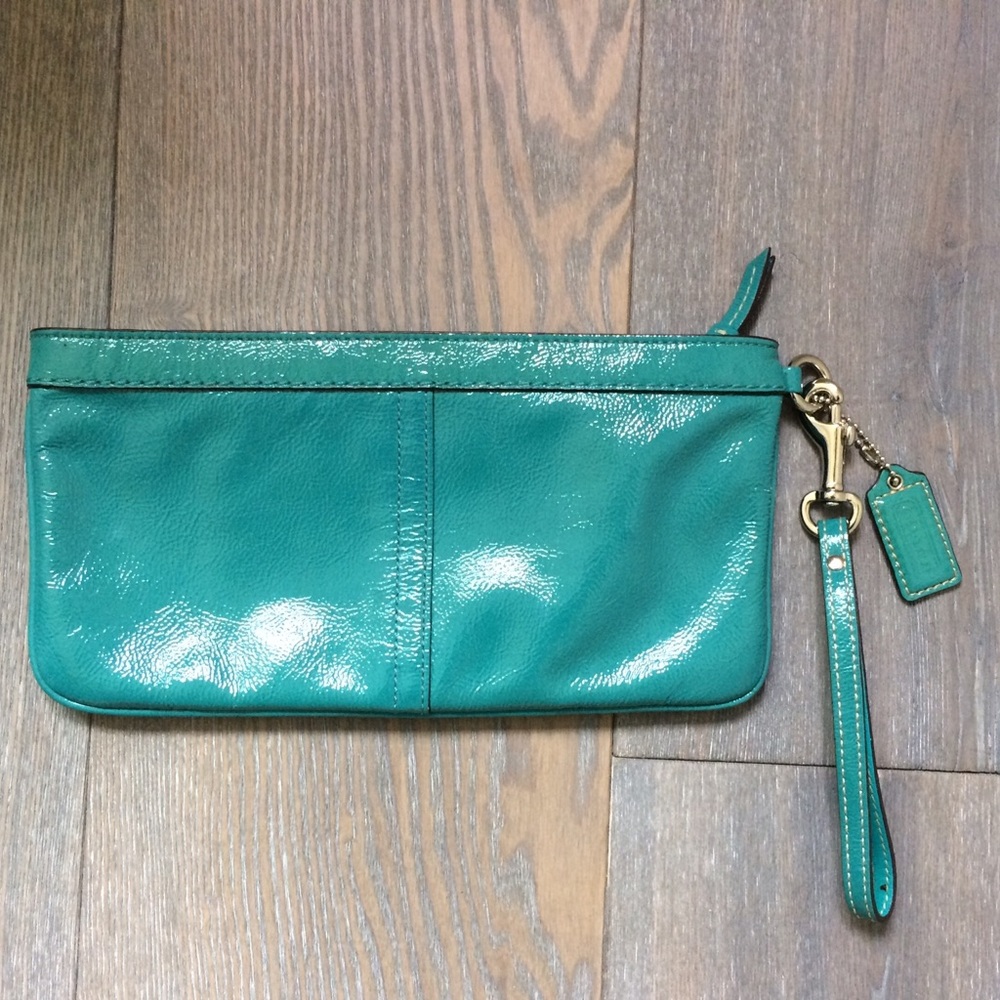 Coach medium teal wristlet clutch