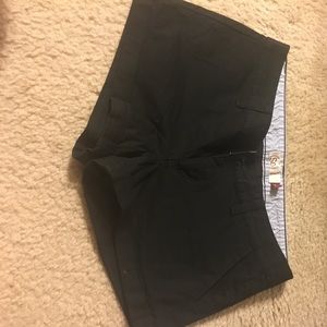 Black shorts. Never been worn