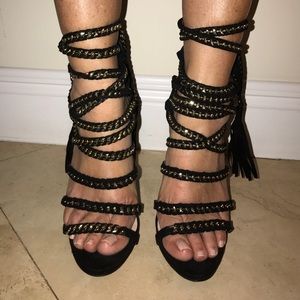 Black tall heels with gold chain