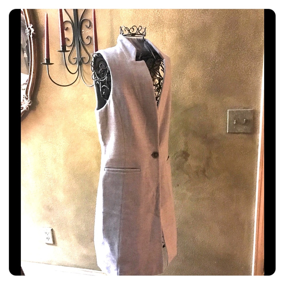 Light, Grey sleeveless jacket