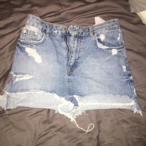 Small torn jean skirt