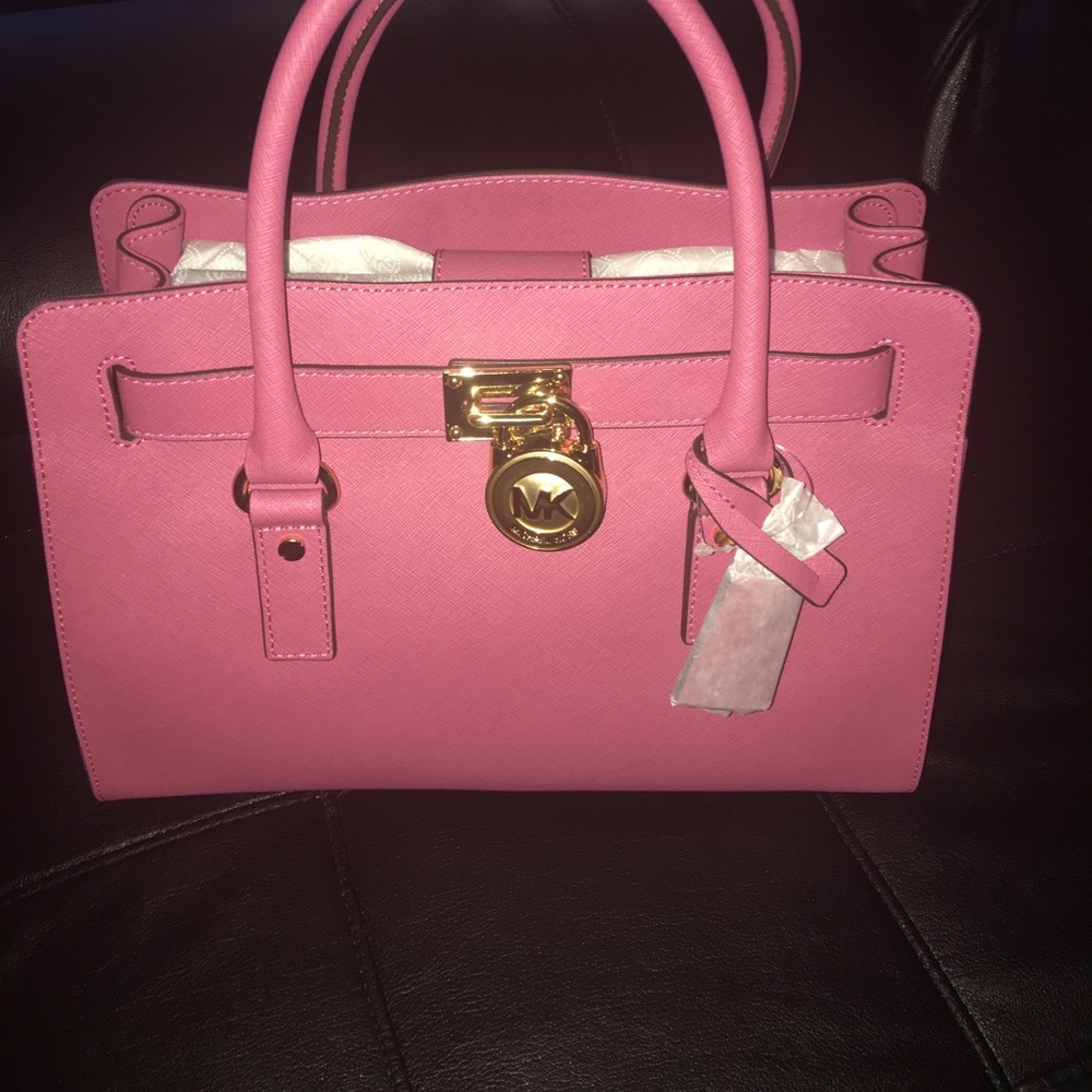 Brand new tags and bag attached! Get it today