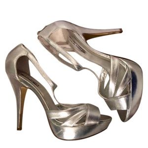 Never worn!! Steve Madden Silver Heels.