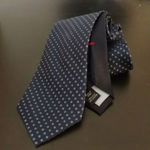 Blue with light blue polka dots tie.