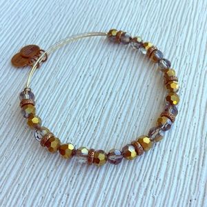 Green and gold Alex And Ani retired beaded bangle
