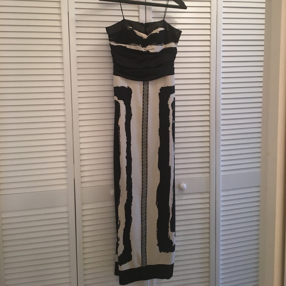 Nicole Miller strapless dress with tags attached.