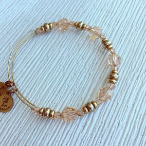 Alex and Ani peach and gold Swarovski beaded