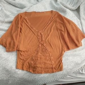 Beautiful burnt orange brunch top!