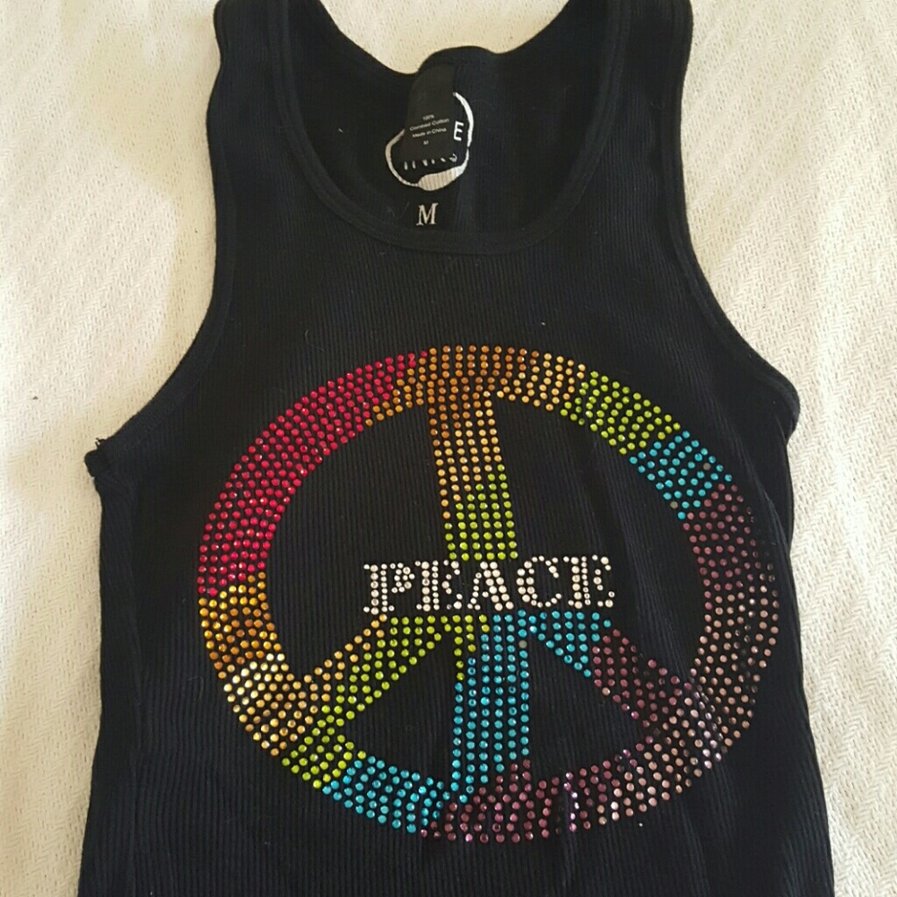 Ladies medium bling tank top fits like a small