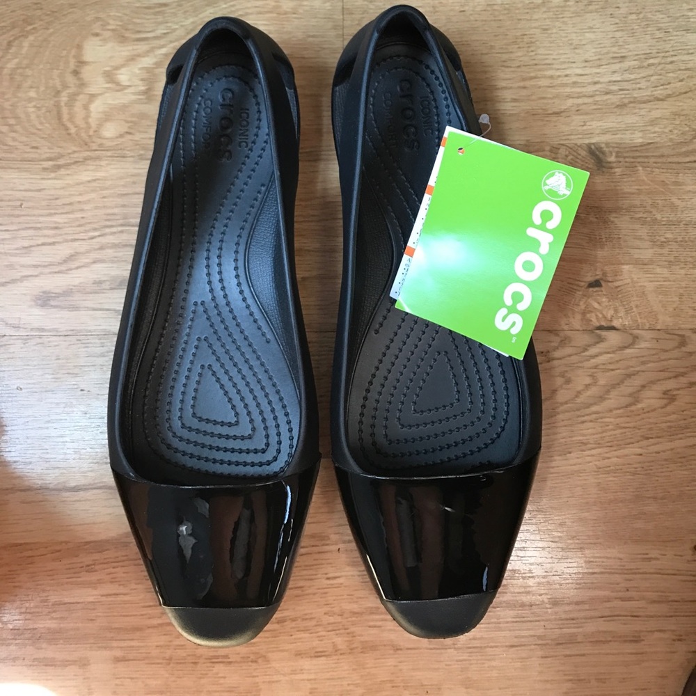 Crocs. Brand new. Women's Size 11 Wide