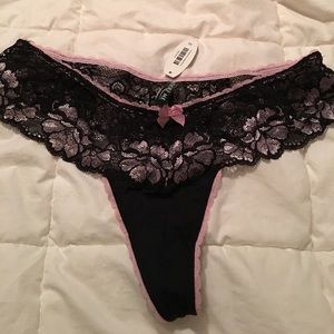 Adore Me black and pink lace thong panty.
