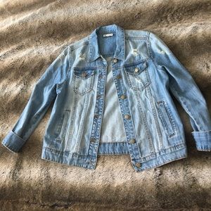 Distressed Buttoned Jean Jacket.