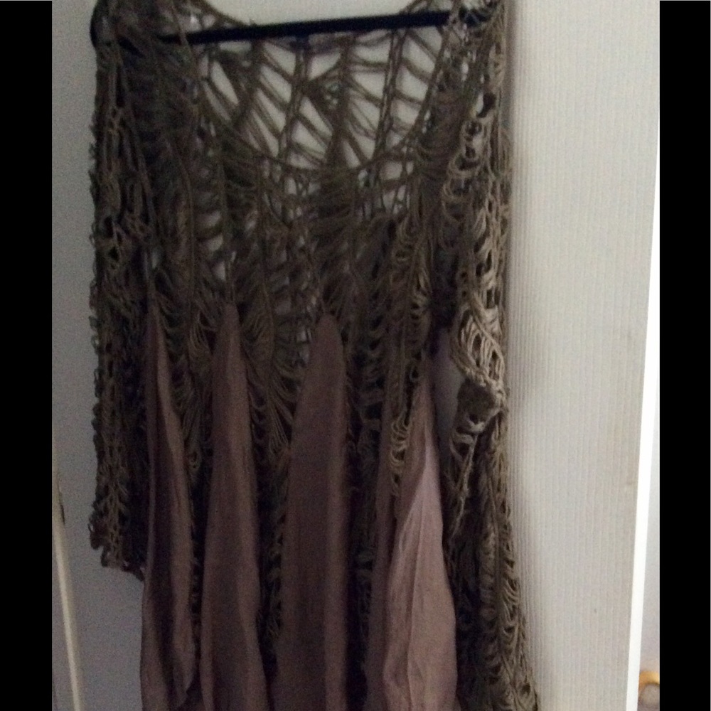 Fun and funky shreds! Great tunic for layering.