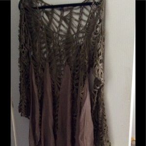 Fun and funky shreds! Great tunic for layering.