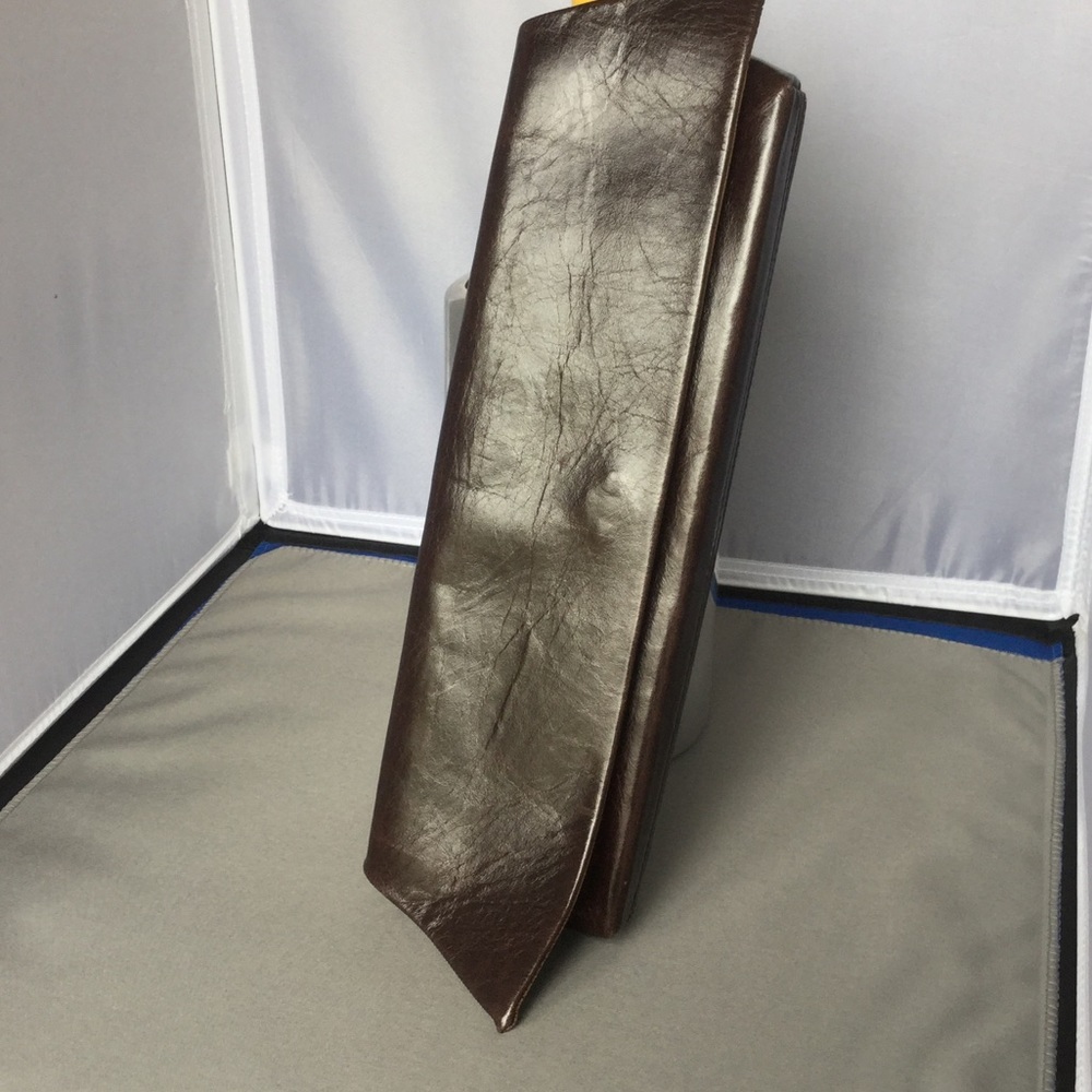 Brown leather clutch