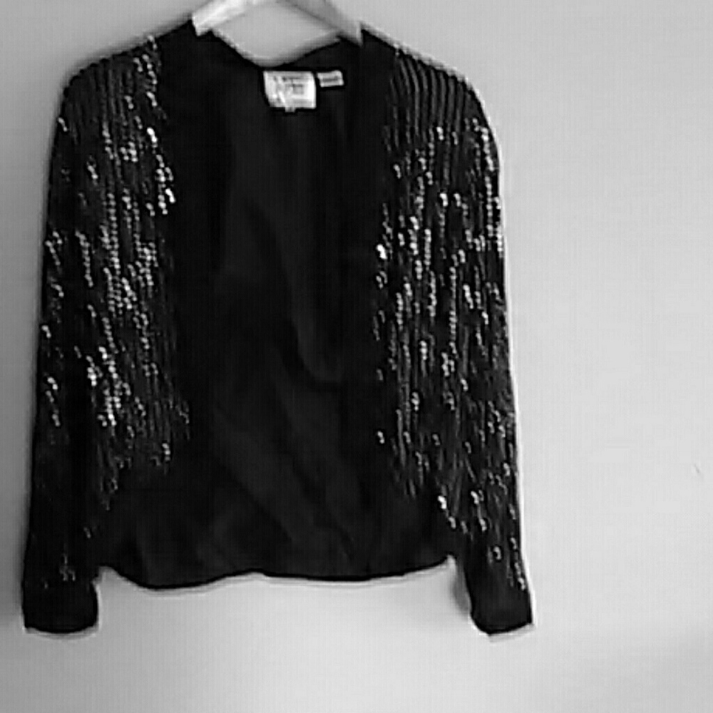 Bead and sequins beautifully embellish this jacket