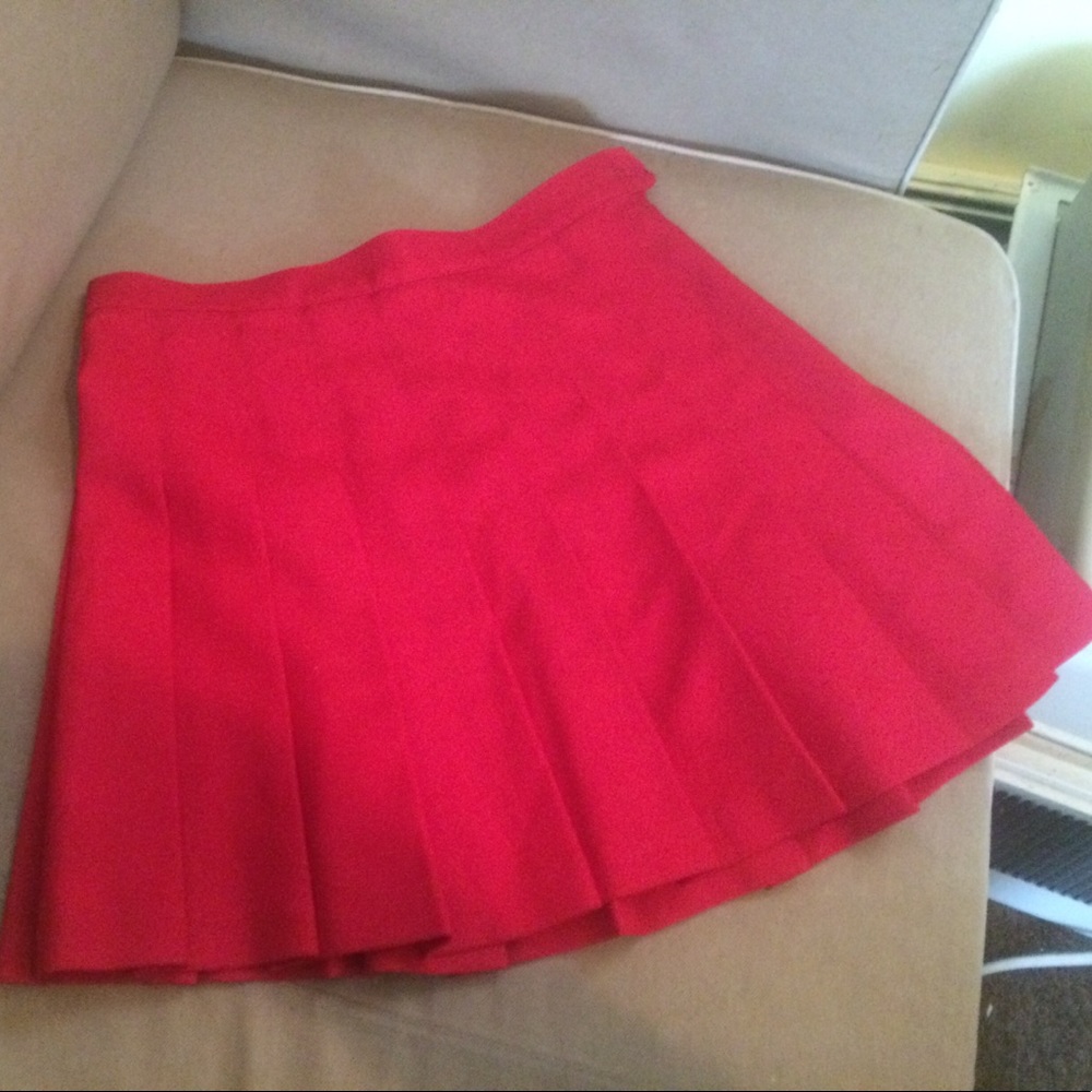 Red pleated skirt