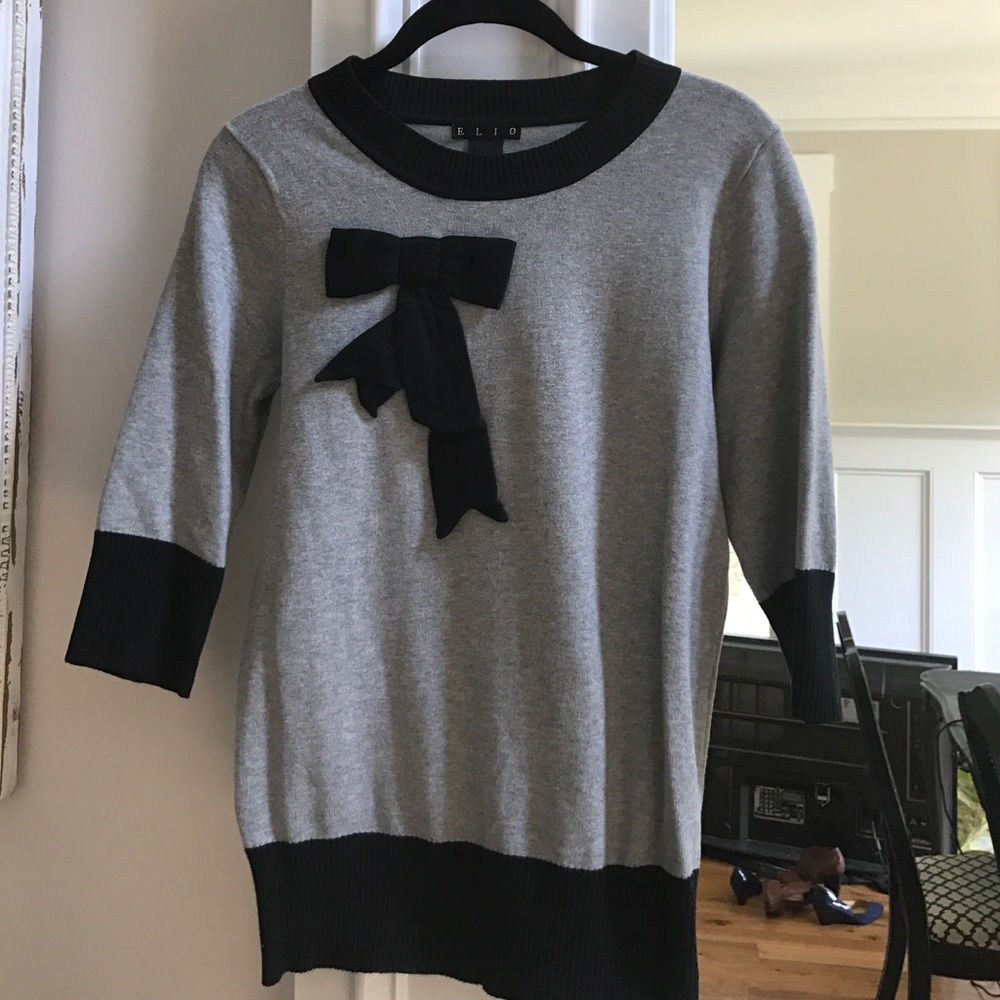 Sweet grey and black sweater with bow.