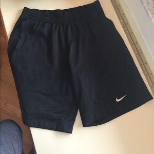 Black Nike running shorts
