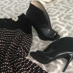 Like new Fergie Black booties/peep toe heels.