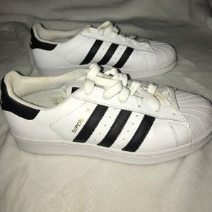 Size 7.5 women's, 5.5 youth superstar adidas