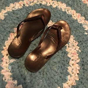 American Eagle Outfitters dark brown flip flops
